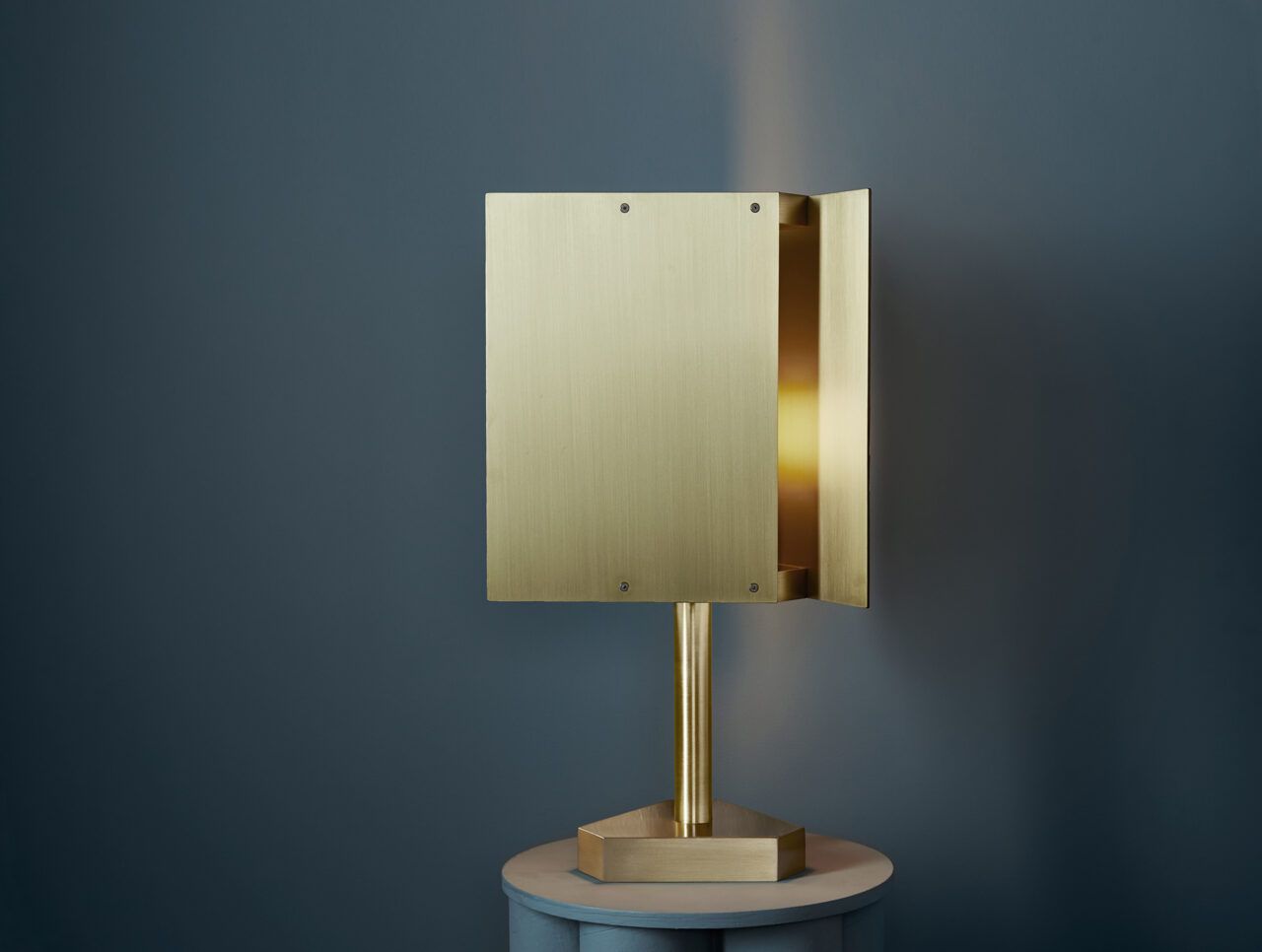 Pelle’s Tripp Table Lamp in satin brass.