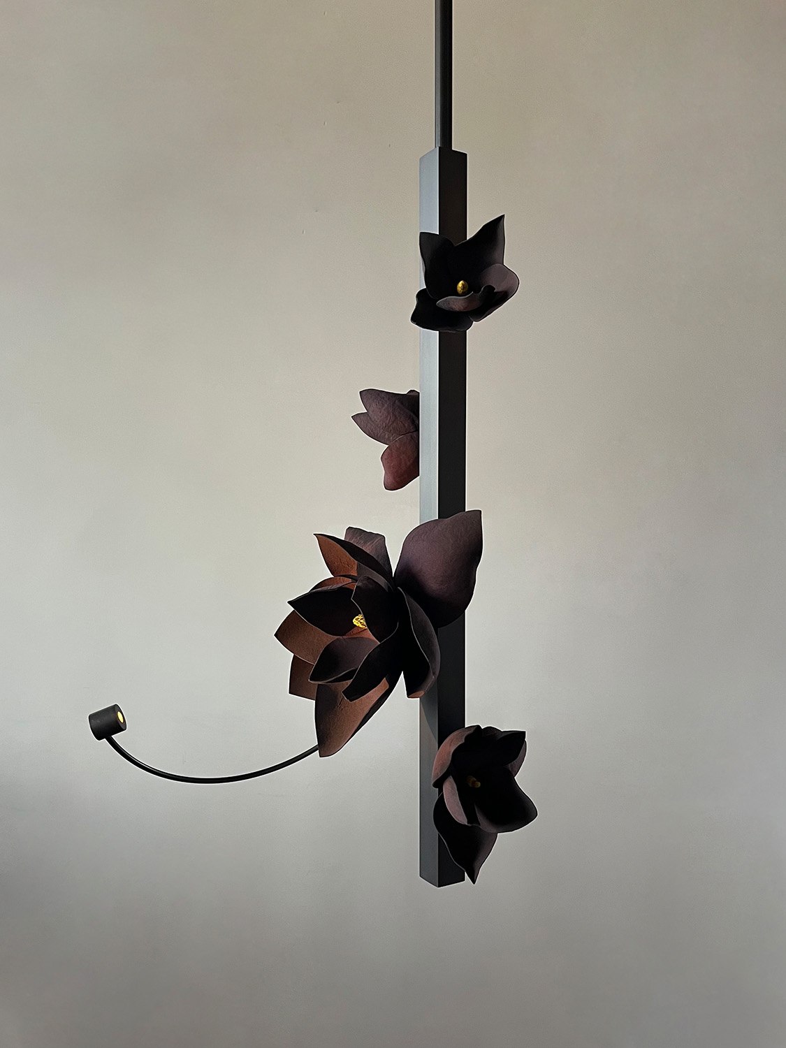 Pelle’s Lure Pendant 32, with black violet flowers handmade by the studio.