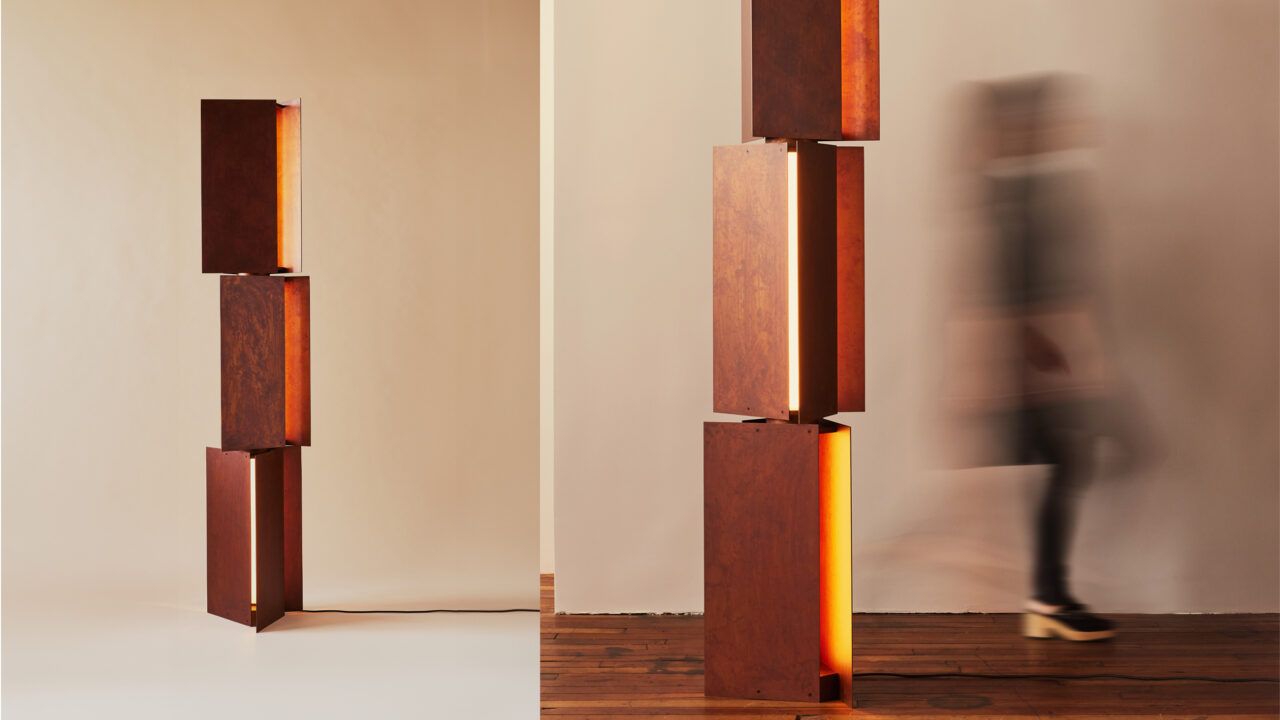 Diptych of Pelle's Tripp Stack floor light in patinated steel.
