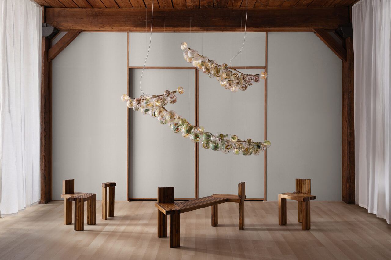 Seven light and nine light horizontal statement bubble chandelier